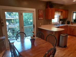 Enjoy cooking in this well-equipped kitchen with a central island and ample counter space.
