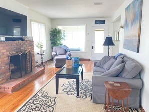 Smart TV, fireplace, books