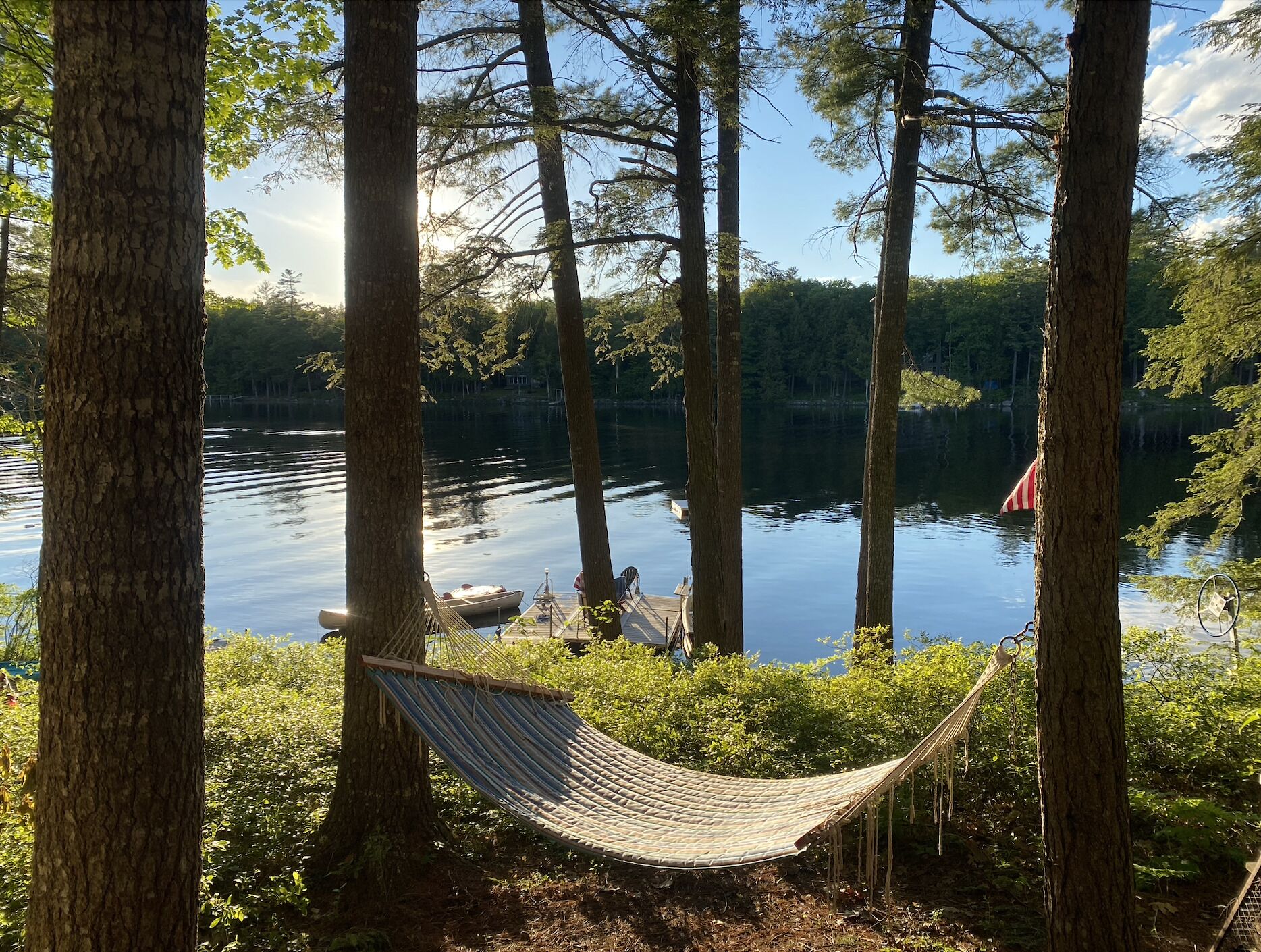 Relax on the hammock overlooking the calm, clean water. 