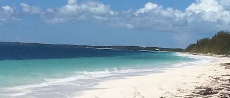 On the beach, sun loungers, beach towels
