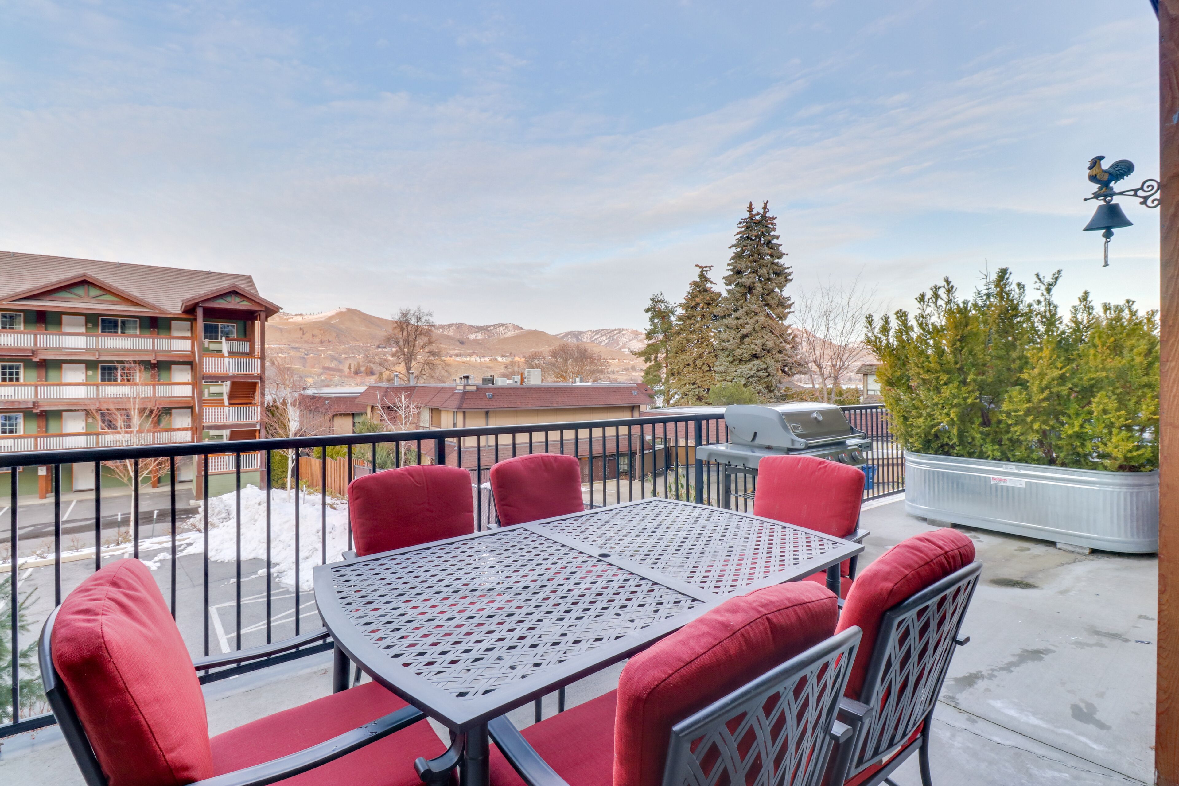 Mountain-view condo with indoor pool & hot tub, private balcony & grill
