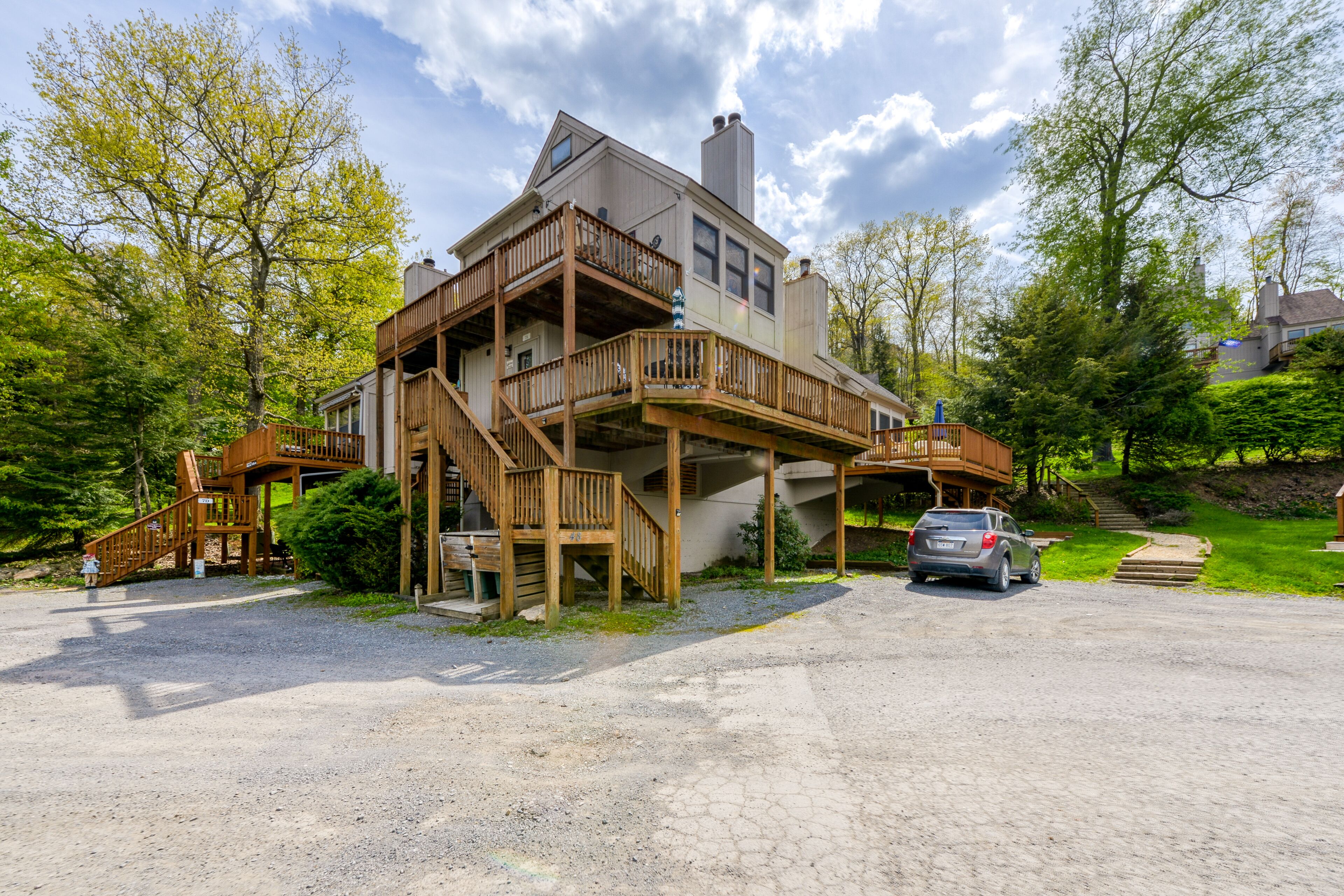 Lake-view condo with deck & firepit - prime location