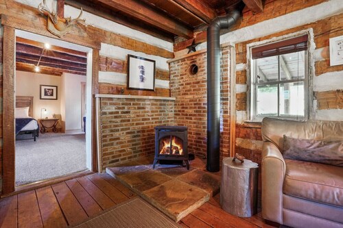 ONE OF A KIND HISTORIC LOG CABIN ON 10+ ACRES IN HOCKING HILLS