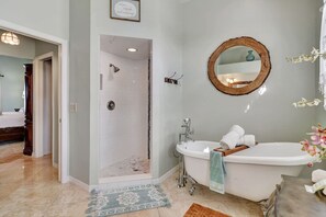 Bathtub, hair dryer, towels, soap