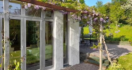Stylish Earth House offering unique seclusion close to bay and heritage town.