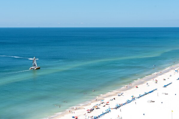 On the beach, sun loungers