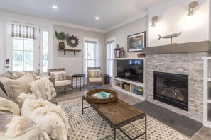 Smart TV, fireplace, books