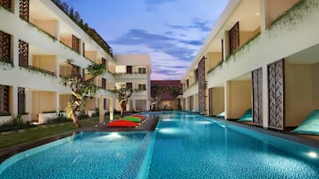 Outdoor pool, open 8:00 AM to 10:00 PM, pool umbrellas, pool loungers