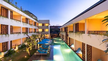 Outdoor pool, open 8:00 AM to 10:00 PM, pool umbrellas, pool loungers