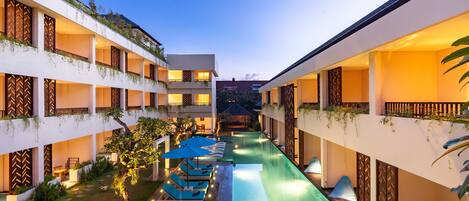 Outdoor pool, open 8:00 AM to 10:00 PM, pool umbrellas, sun loungers