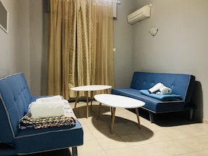 Appartement, 1 chambre | Coin séjour