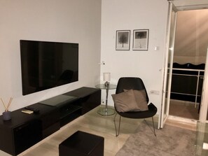 Appartement | Coin séjour | Télévision à écran plat