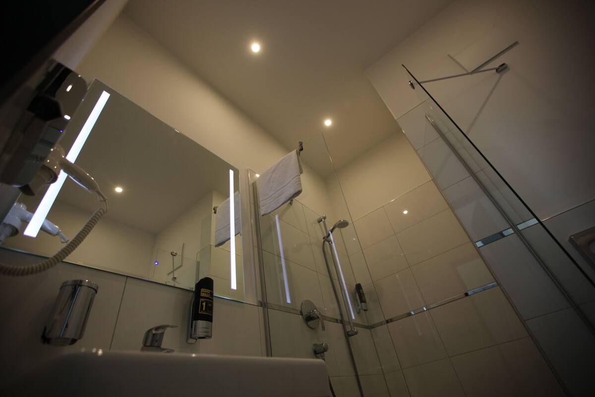 shower, free toiletries, hair dryer, heated floors