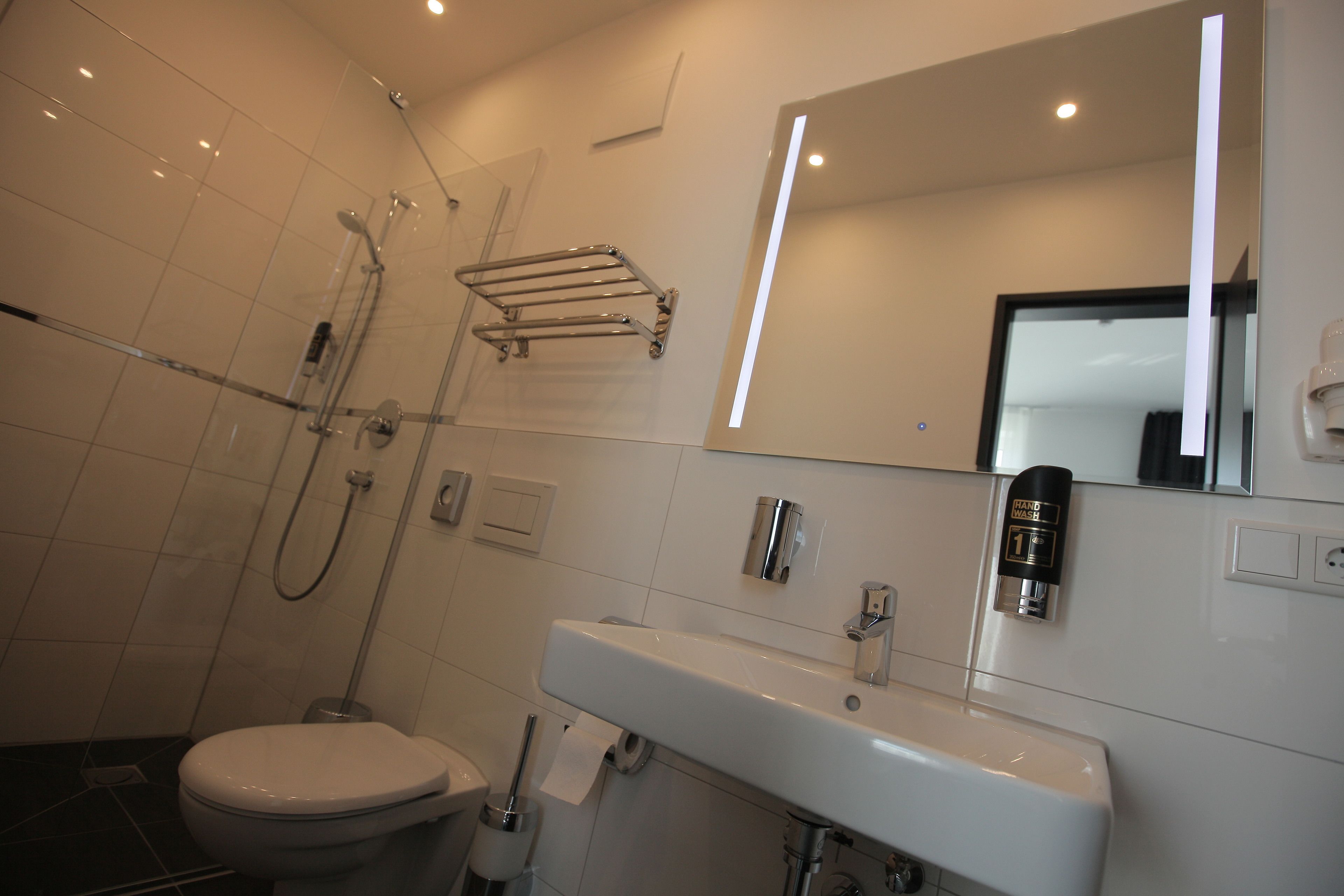 shower, free toiletries, hair dryer, heated floors