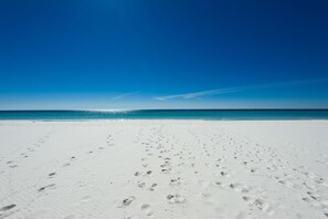 On the beach, sun-loungers