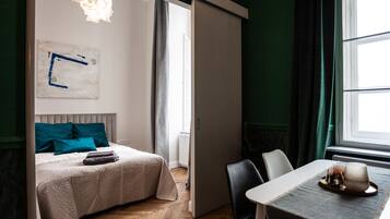 Apartamento, 2 quartos | 2 quartos, Wi-Fi de cortesia, roupa de cama