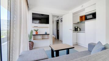 Comfort appartement, 2 tweepersoonsbedden, niet-roken | Privékeuken | Een koelkast, een oven, een kookplaat, een vaatwasser