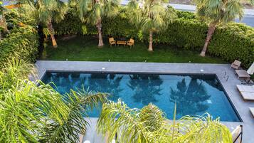 Outdoor pool, open 8:00 AM to 6:00 PM, pool umbrellas, sun loungers