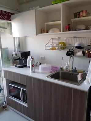Fridge, microwave, coffee/tea maker, electric kettle
