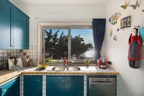 컴포트 아파트, 침실 3개 (1287-PP Apartment) | 전용 주방 | 대용량 냉장고, 전자레인지, 오븐, 쿡탑