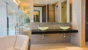 A modern bathroom with a glass-enclosed shower, two sinks, and a large bathtub. - Atika Villa 1 oceanfront pool villa (Patong)