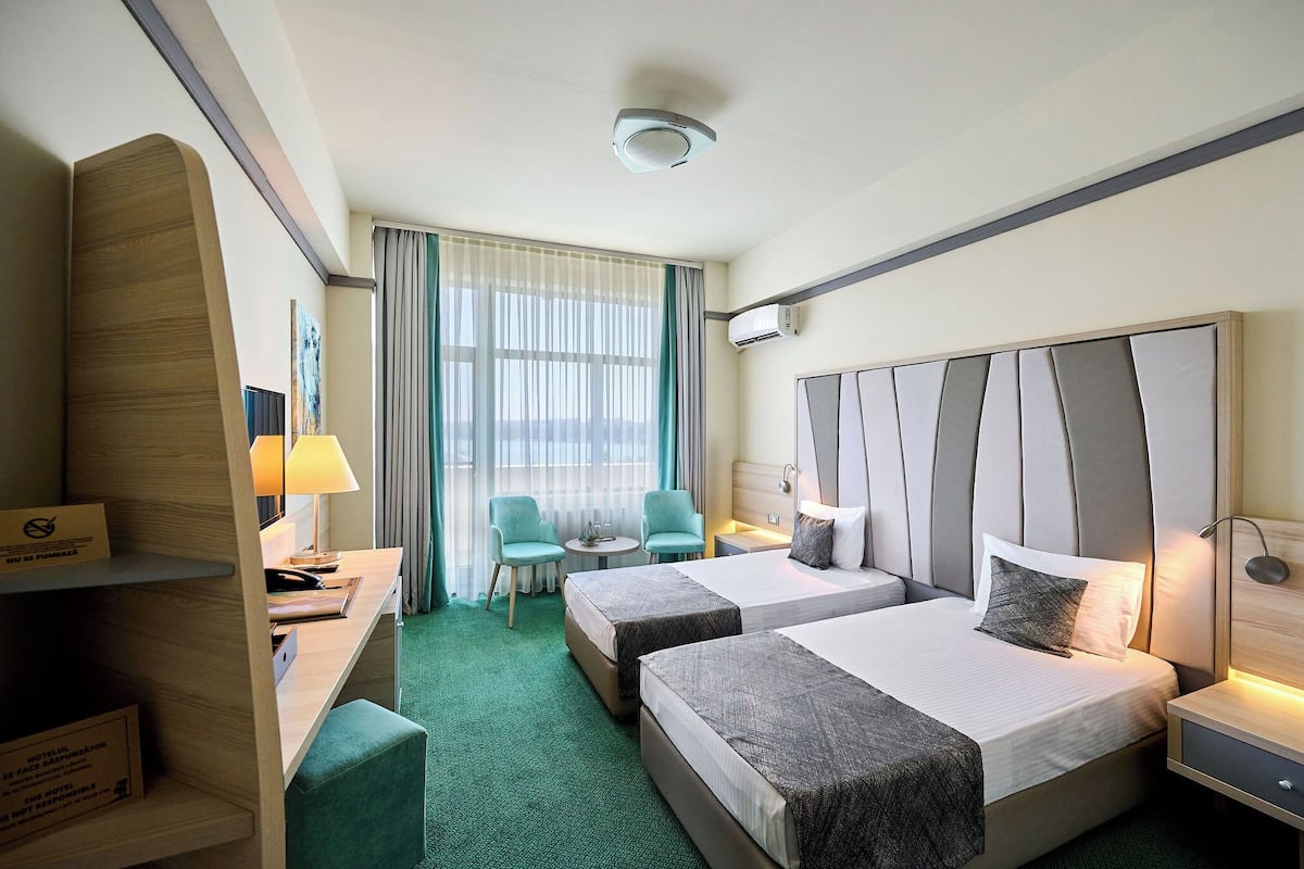 Standard Twin Room, Balcony, City View | 1 bedroom, minibar, in-room safe, desk
