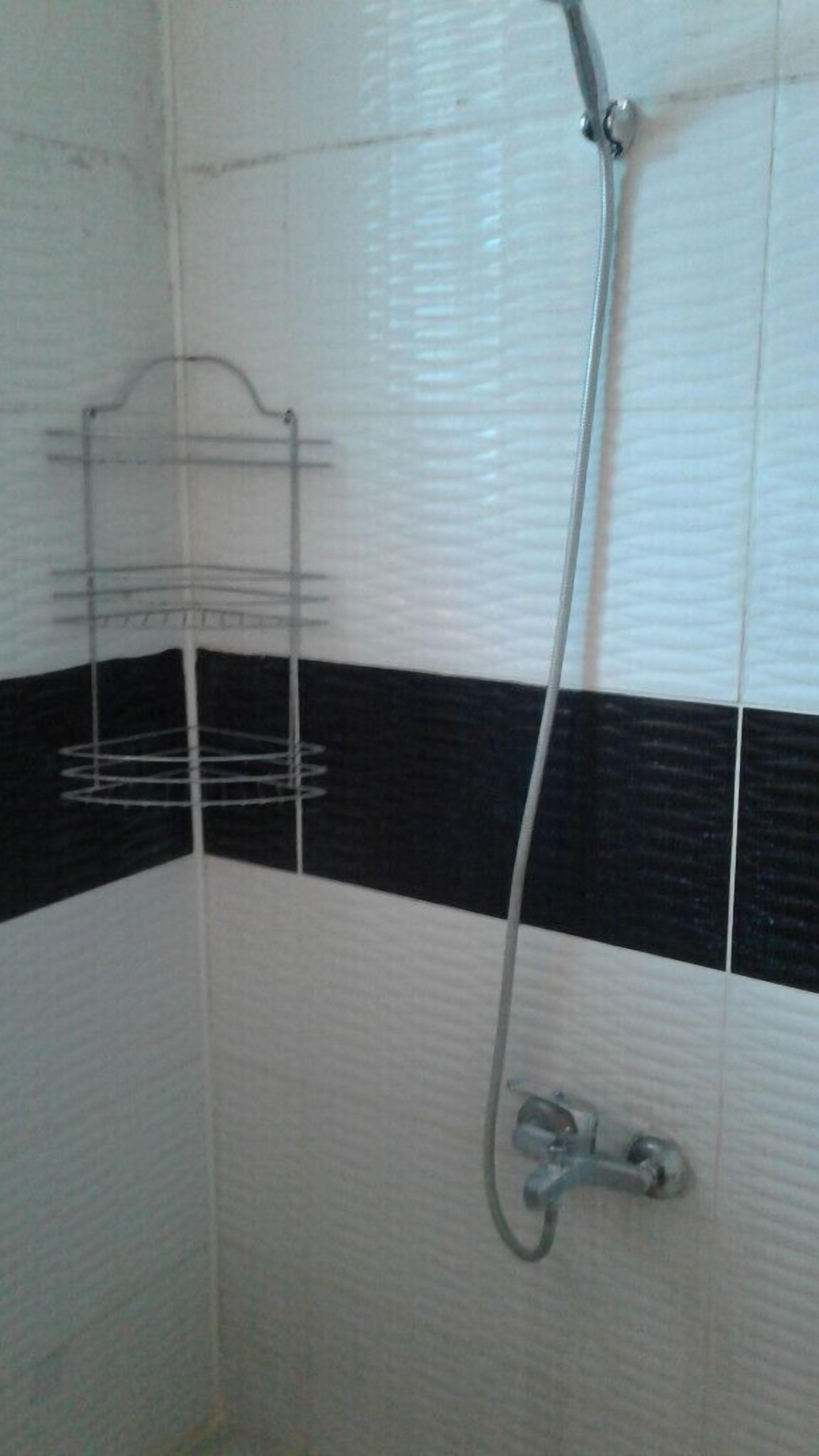 Apartment, 2 Bedrooms | Bathroom | Shower, slippers, towels