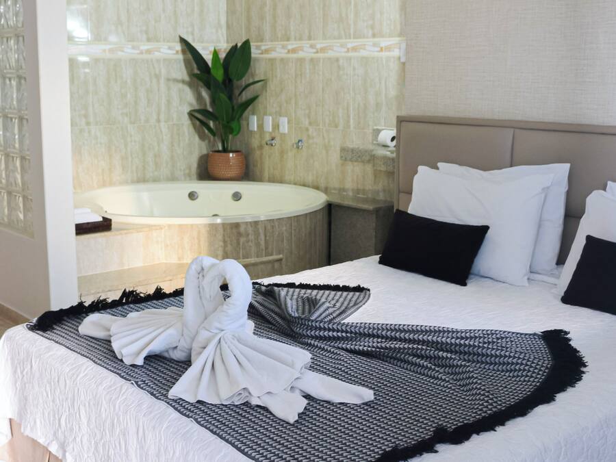 Minibar, desk, blackout drapes, iron/ironing board