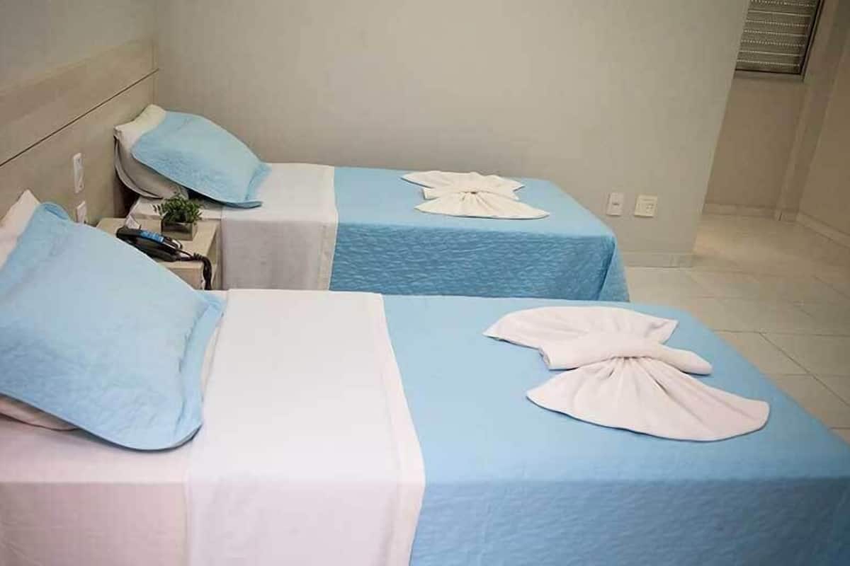 Minibar, desk, blackout curtains, iron/ironing board