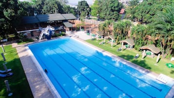 Outdoor pool, open 6:00 AM to 10:00 PM, free pool cabanas
