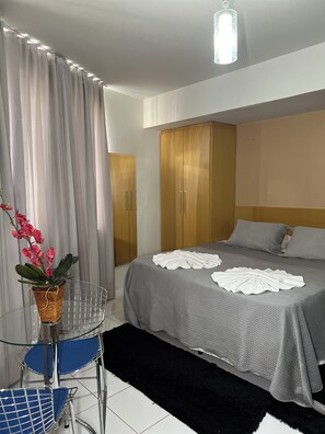Deluxe Double Room | Minibar, desk, blackout drapes, iron/ironing board