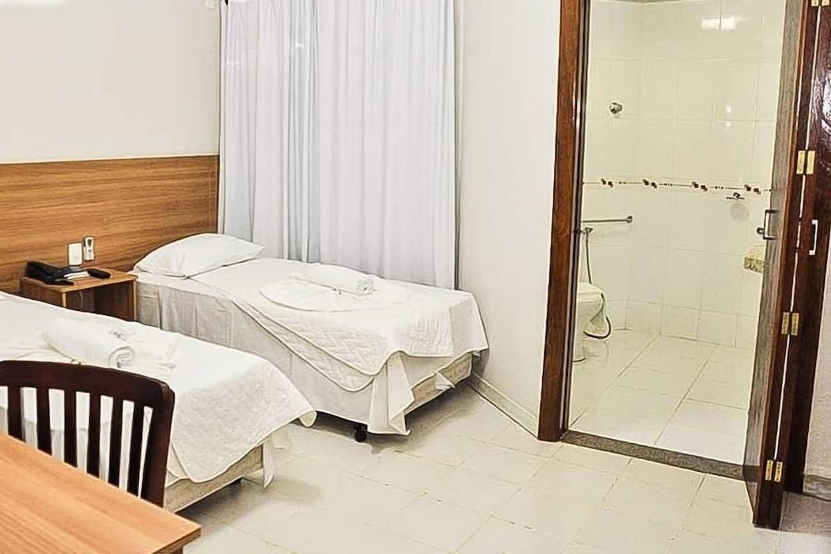 Deluxe Twin Room | Minibar, desk, blackout curtains, iron/ironing board