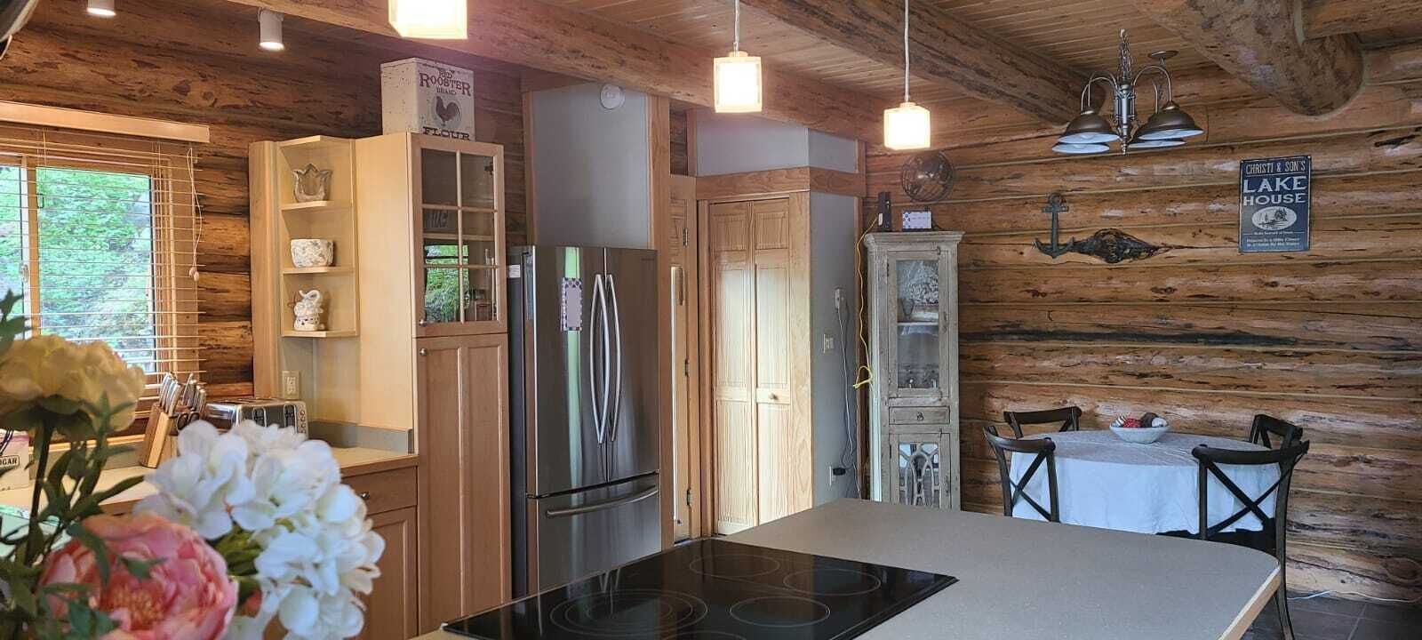 Waterfront w/ Water Slide, Rock Climbing Wall & Ice Fishing Shanty in Winter