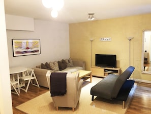 Apartment | Living room | 40-inch flat-screen TV with digital channels, TV, Netflix