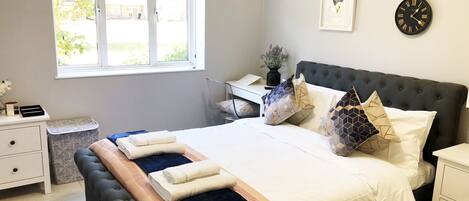 Departamento | Tabla de planchar con plancha, wifi gratis y ropa de cama