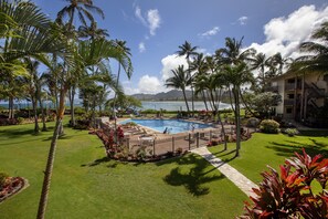 Outdoor pool, a heated pool - Lae Nani 423, Stunning Oceanfront View, Newly Remodeled In Tasteful Island Decor (Kapaa)