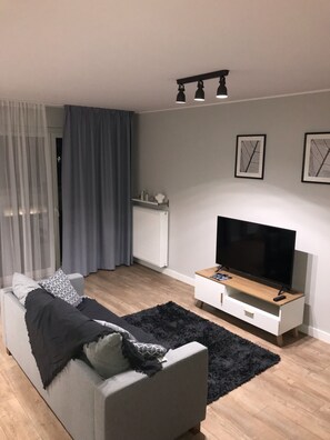 Appartement Prestige | Aire de séjour | Téléviseur connecté