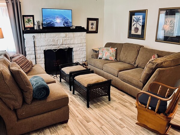 Smart TV, fireplace, DVD player, books