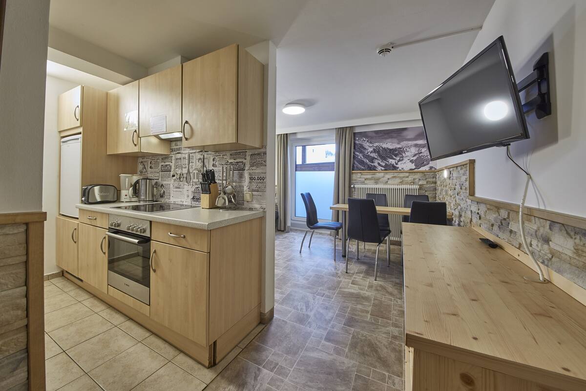 Leilighet, 1 soverom, fjellutsikt (Appartement Top 1) | Oppholdsområde | En 50-tommers Flatskjerm-TV med kabel-kanaler samt TV