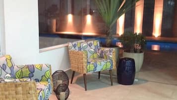 Outdoor pool, open 6:00 AM to 7:00 PM, pool loungers