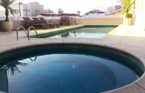 Outdoor pool, open 6:00 AM to 7:00 PM, sun loungers