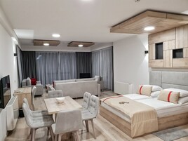 Premium Apartment, City View | In-room safe, blackout drapes, soundproofing, iron/ironing board