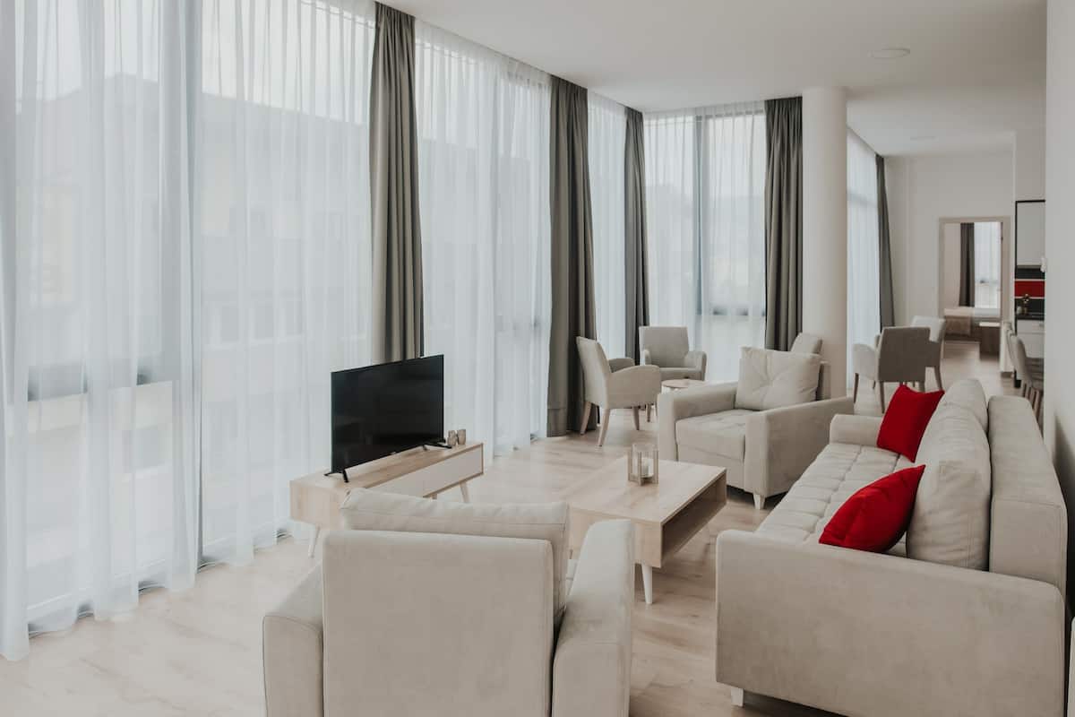 Penthouse, 4 Bedrooms, City View | Living area | 42-inch LCD TV with cable channels, TV