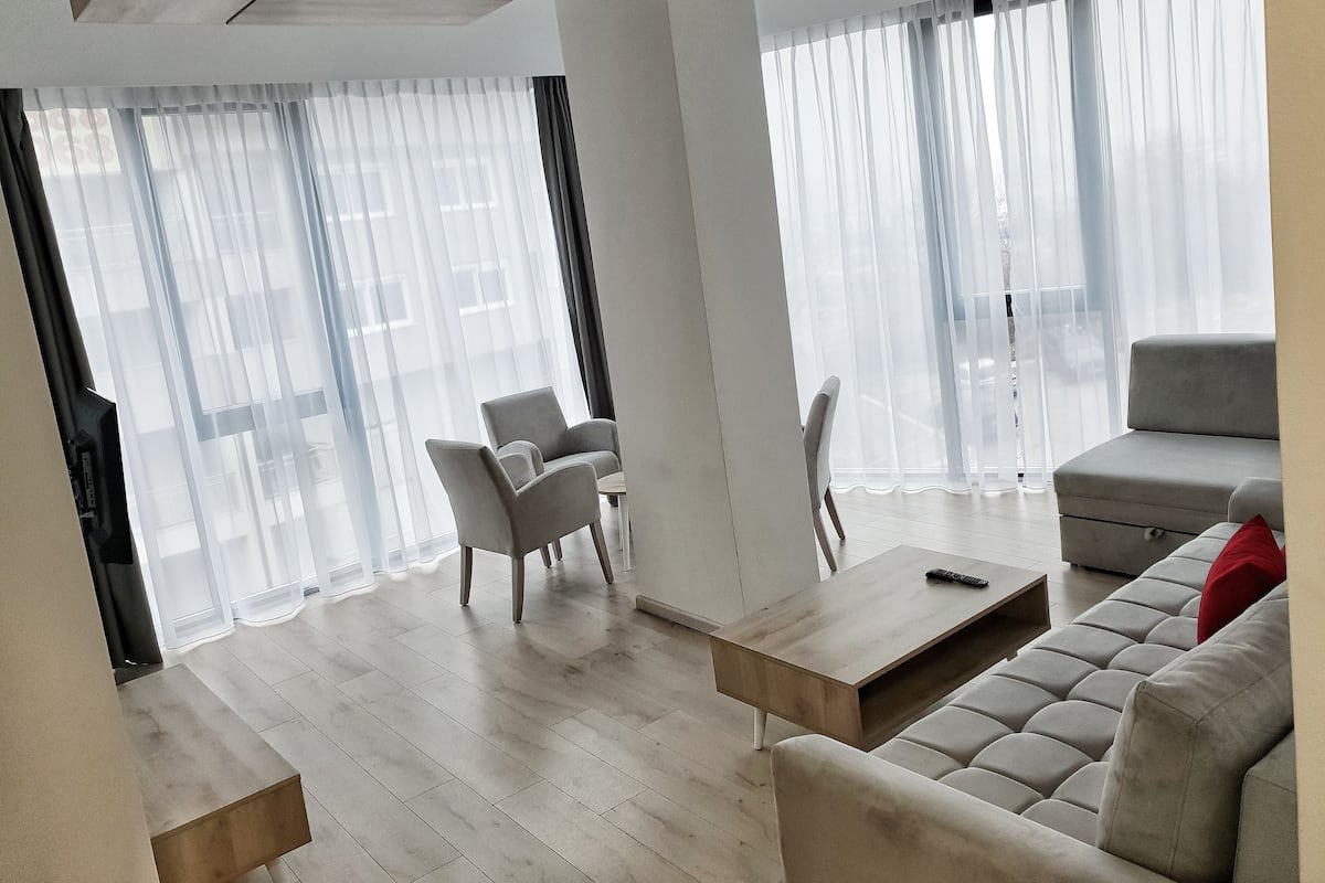 Superior Apartment | Living area | 42-inch LCD TV with cable channels, TV
