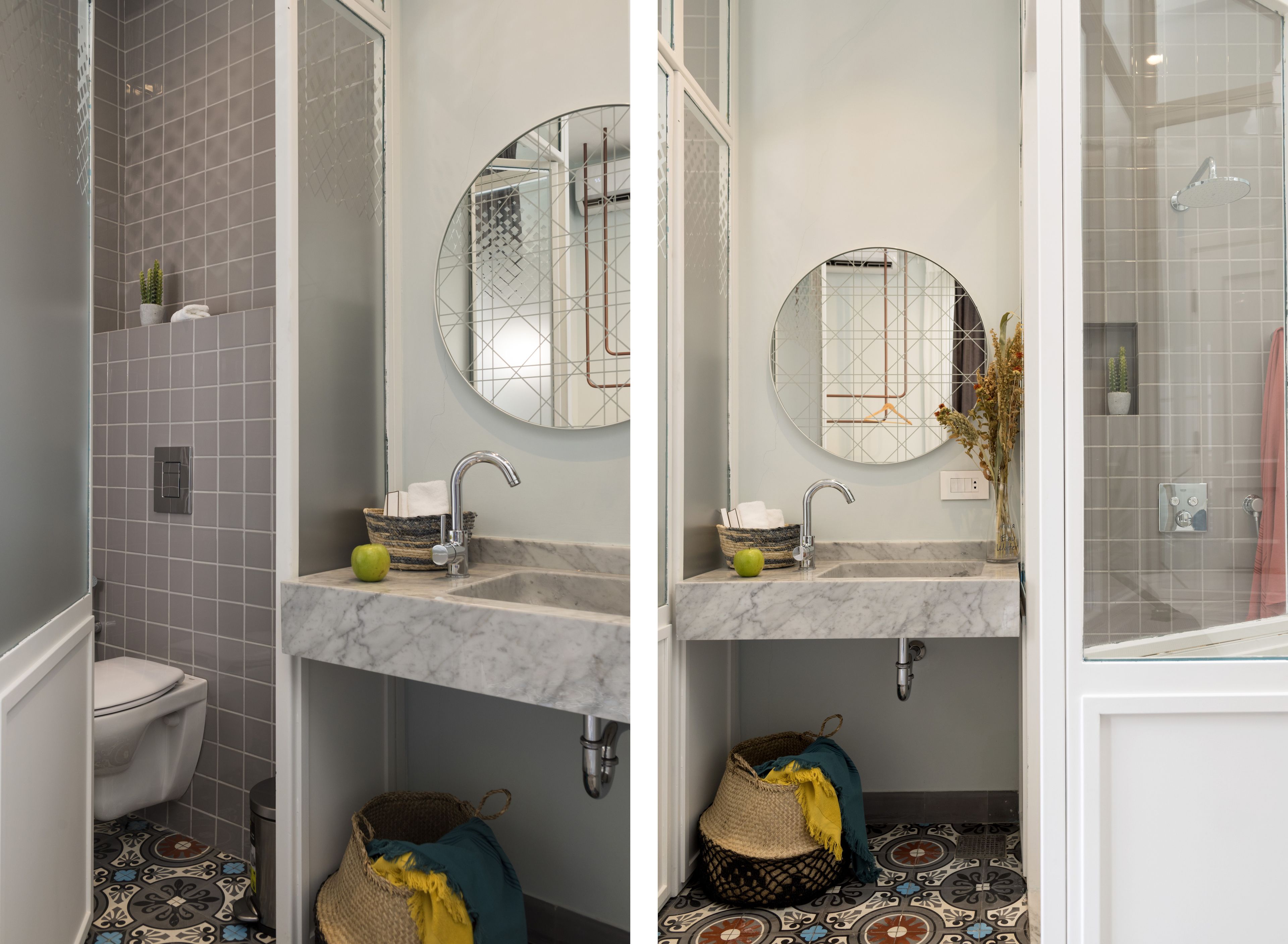 A bathroom with a toilet, sink, and shower.