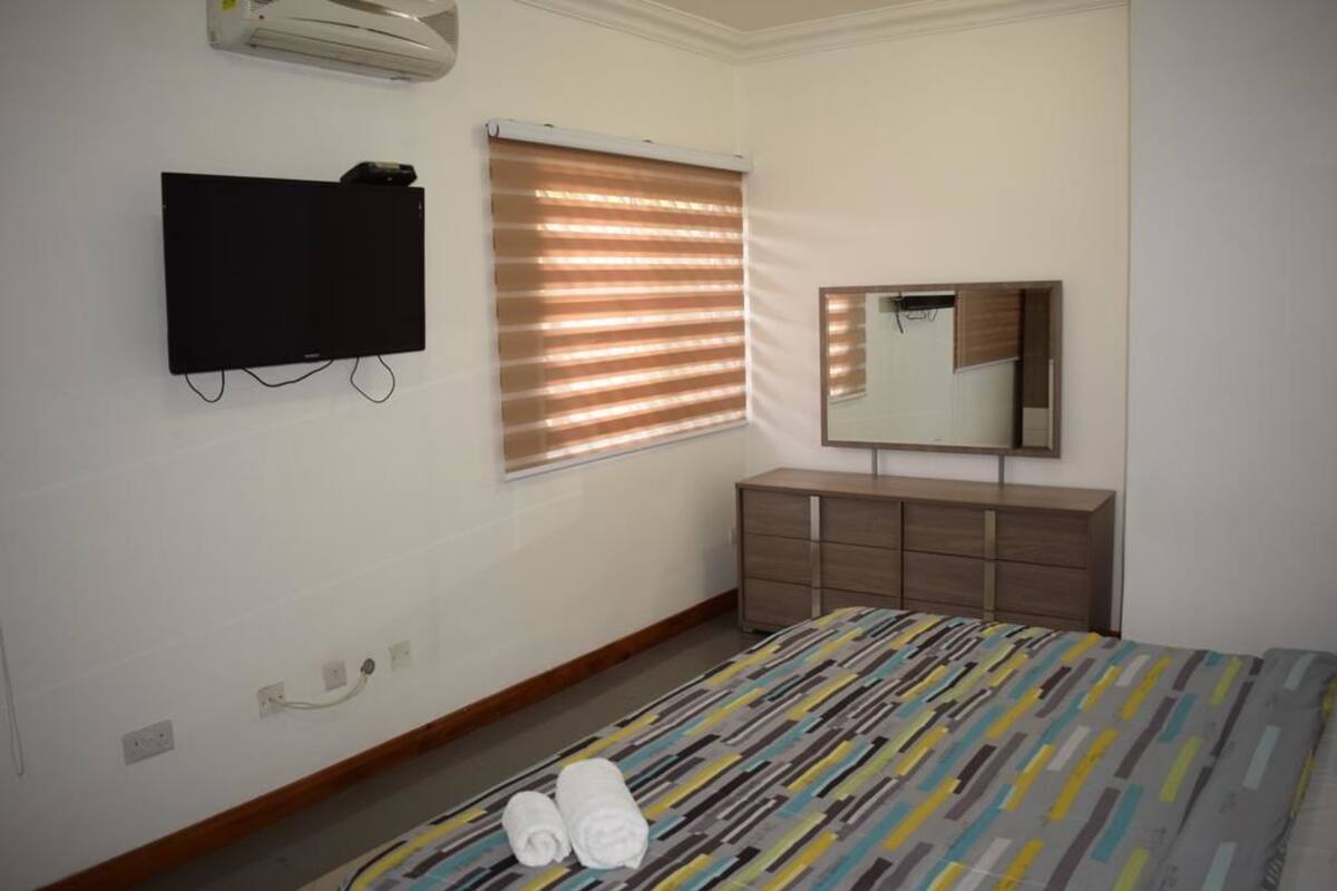 Apartment, 1 Bedroom | Down comforters, blackout drapes, rollaway beds (surcharge), WiFi (free)