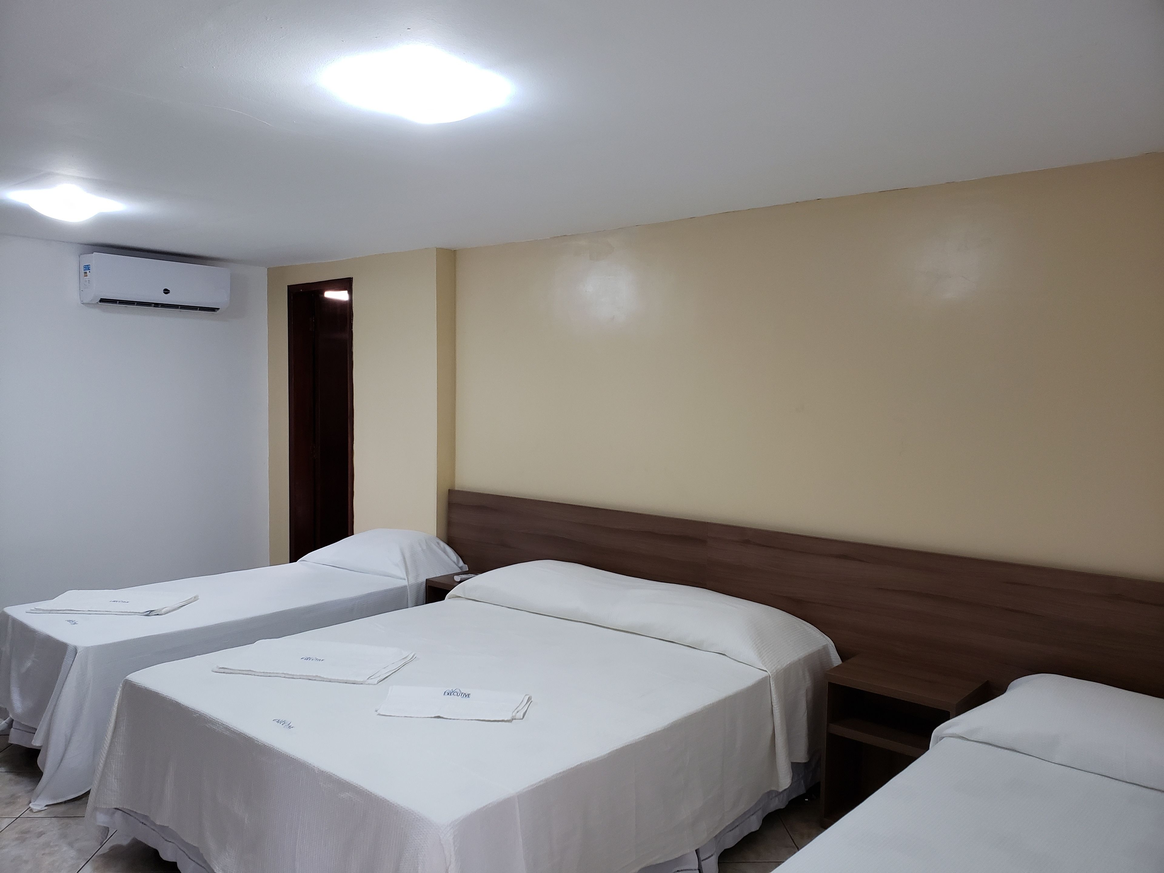 triple room | minibar, in-room safe, desk, blackout curtains