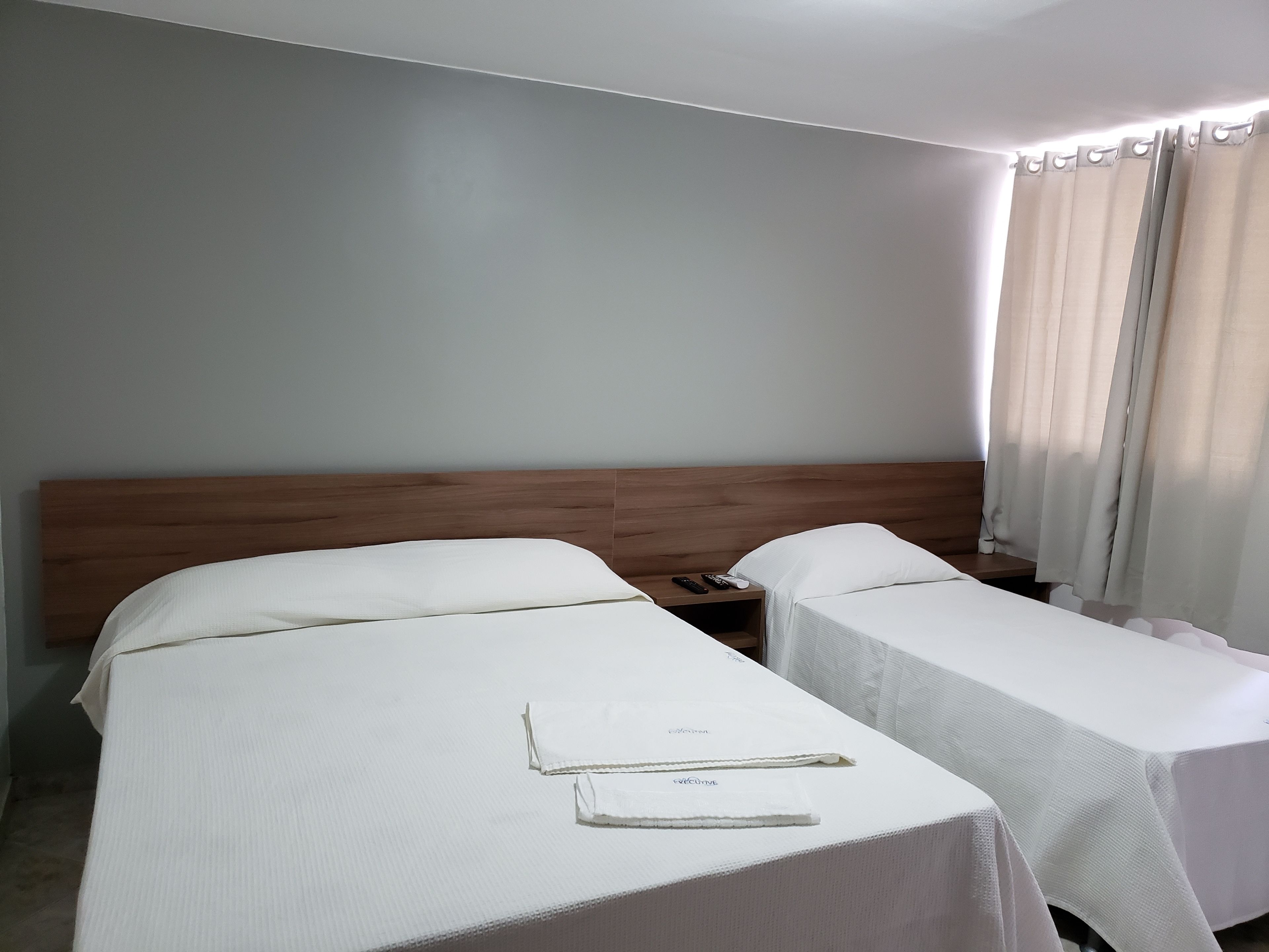 triple room | minibar, in-room safe, desk, blackout curtains