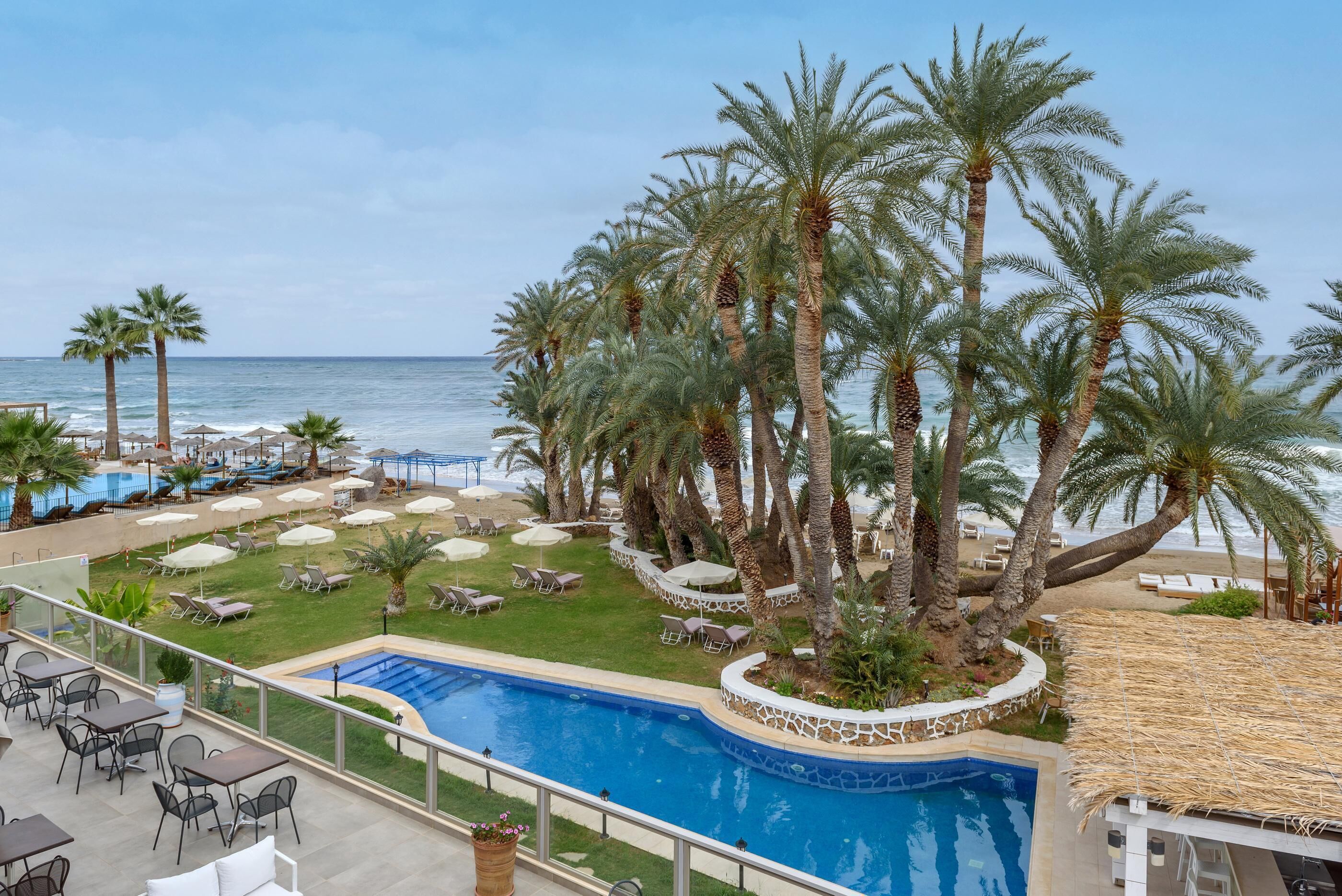 Outdoor pool, open 10:00 AM to 6:00 PM, pool umbrellas, pool loungers