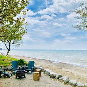 On the beach, sun-loungers, beach towels
